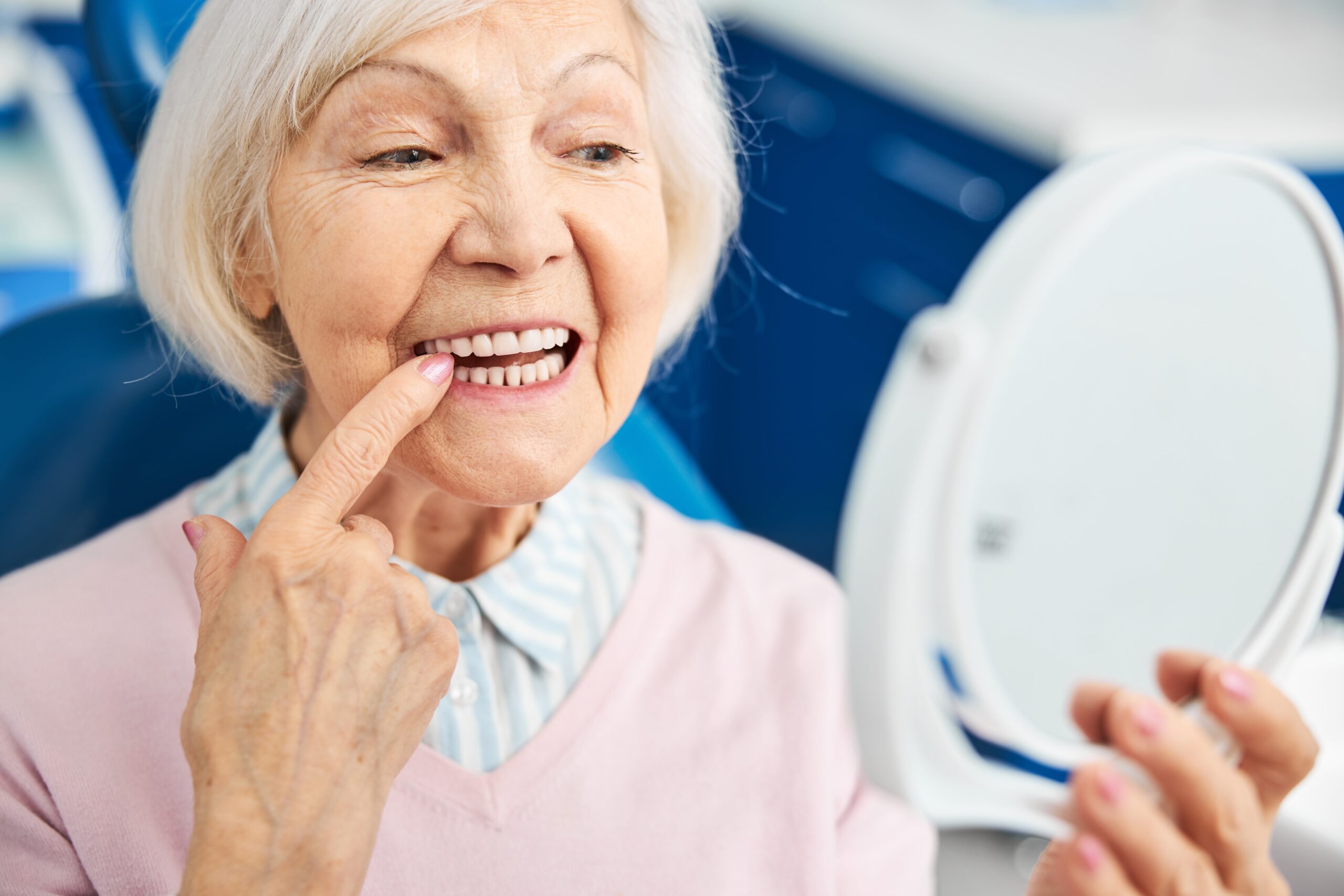 Older Woman with Loose Tooth