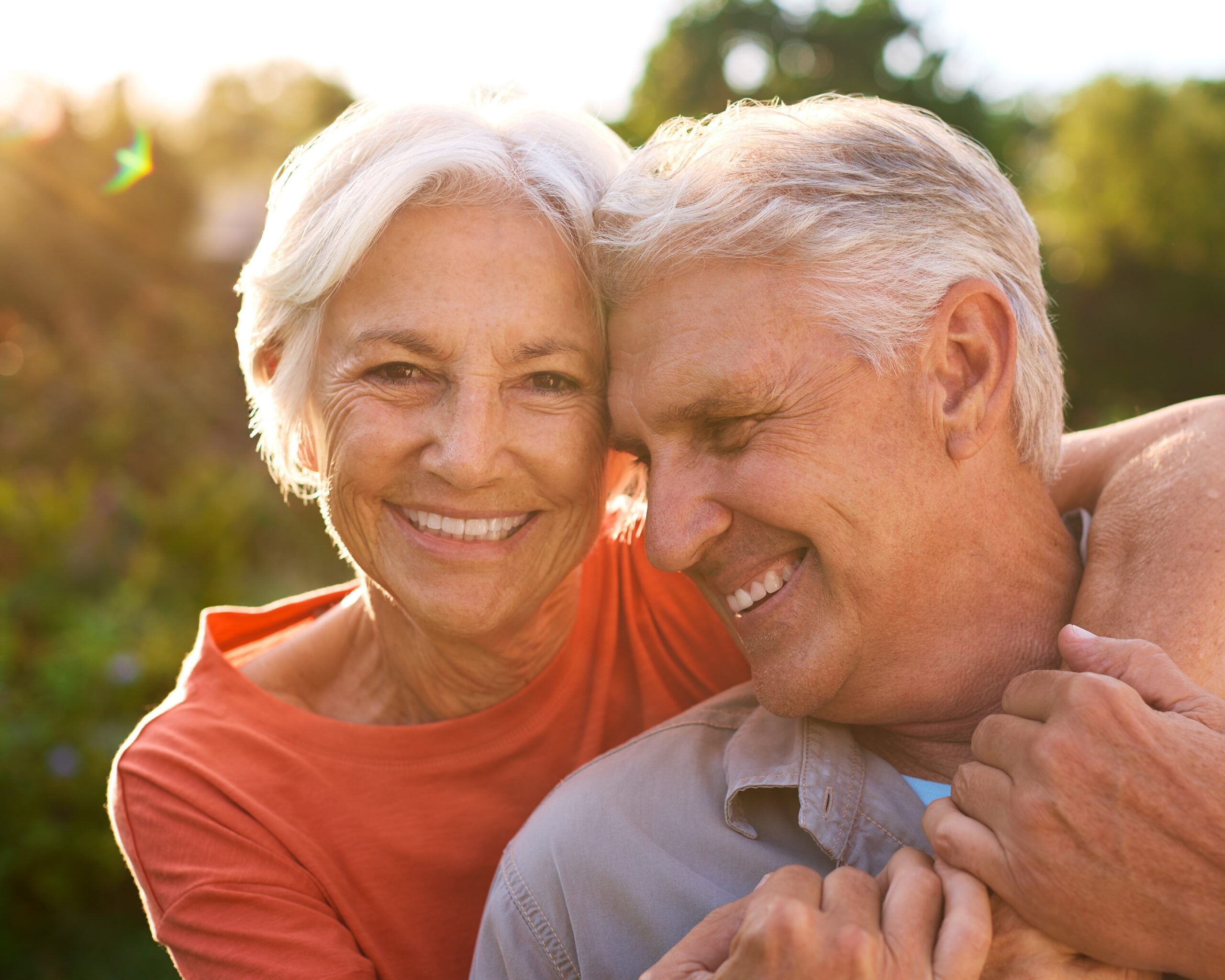 Older Couple Smiling and Hugging
