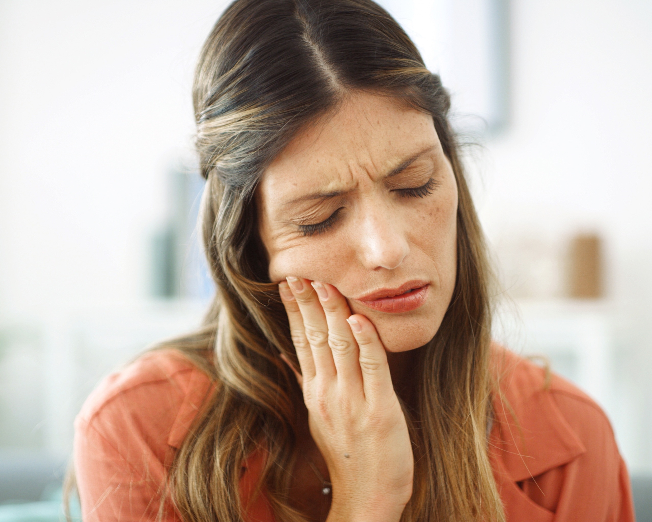 Woman Sore Mouth and toothache at house from Dental Cavity